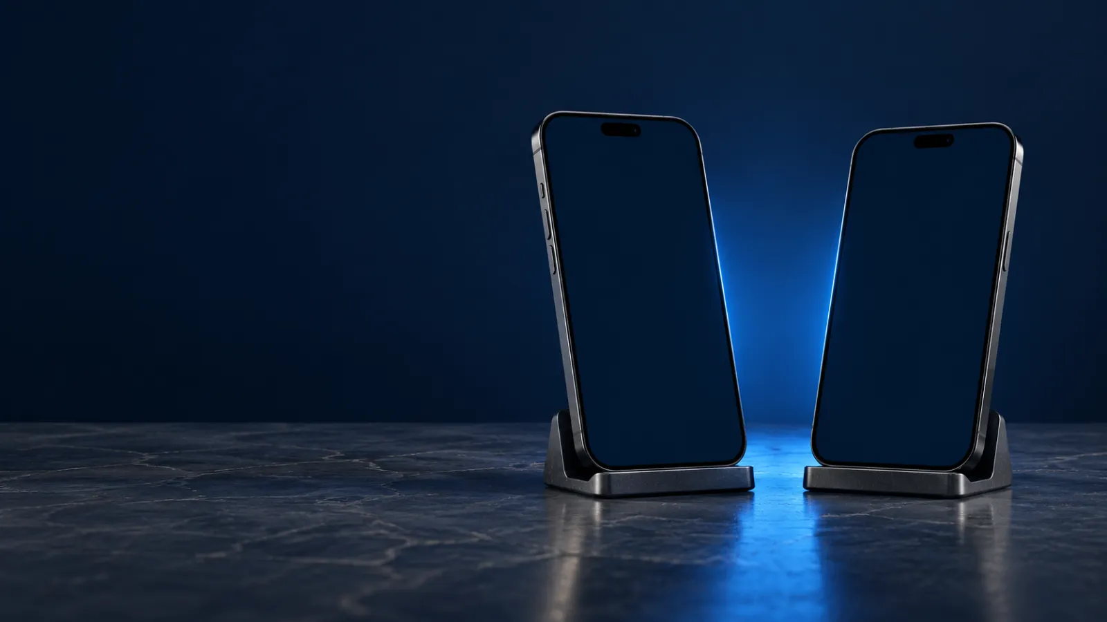 Dos móviles de pie, uno frente a otro, con luz azul entre ellos